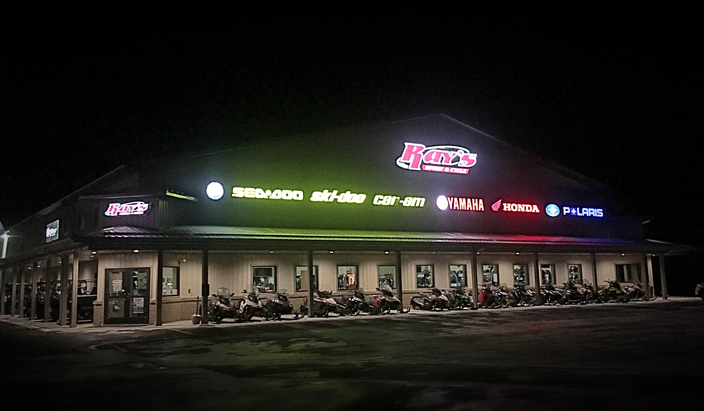 Outside View At Night Of Ray's Sport & Cycle